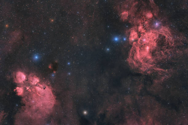 NGC 6334, colloquially known as the Cat's Paw Nebula, Bear Claw Nebula, or Gum 64, is an emission nebula and star-forming region located in the constellation Scorpius. NGC 6357 is a diffuse nebula near NGC 6334. The nebula contains many proto-stars shielded by dark discs of gas. Taken at Vallejos Viewpoint, Málaga. Andalusia. South of Spain.