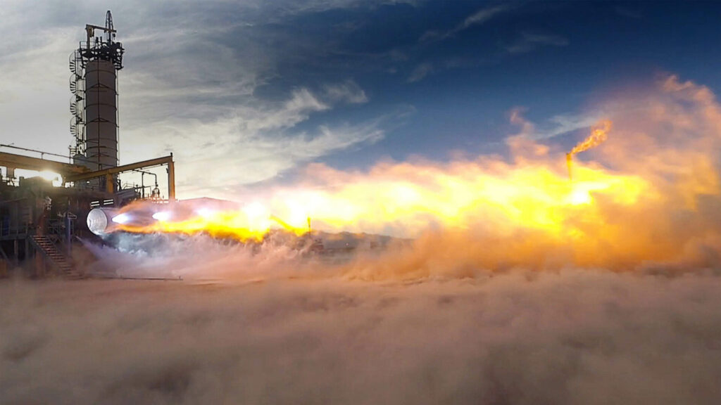 This image from Blue Origin showcases a close-up of their BE-4 engine during a test firing. The engine, designed to burn liquefied natural gas and oxygen, produces a staggering 550,000 pounds of thrust, making it one of the most powerful engines currently in development.