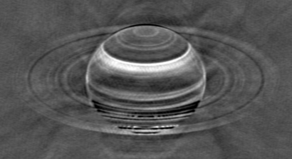 Radio image of Saturn taken with the VLA in May 2015, with the brighter radio emissions from Saturn and its rings subtracted to enhance the contrast in the fainter radio emissions between the various latitudinal bands in the atmosphere. Since ammonia blocks radio waves, the bright features indicate areas where ammonia is depleted and the VLA could see deeper in the atmosphere. 