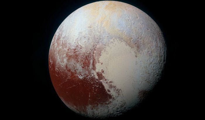 A high-resolution image of Pluto's heart nicknamed "Tombaugh Regio". Pluto is no longer  a planet in our solar system (Image credit: Pinterest)