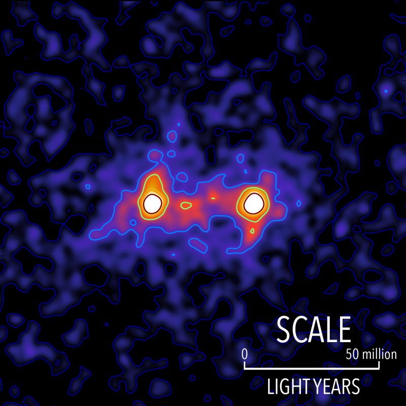 Dark matter filaments bridge the space between galaxies in this false-color map. The locations of bright galaxies are shown by the white regions and the presence of a dark matter filament bridging the galaxies is shown in red. Image via RAS/ S. Epps & M. Hudson / University of Waterloo.